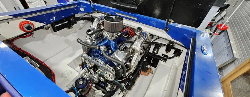 Slide: The Image of Engine compartment of 2003 Ultimate Warlock 29 World Class Offshore Race boat. - 11