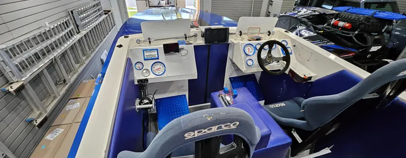 Slide: The Image of Interior of 2003 Ultimate Warlock 29 World Class Offshore Race boat with Sparco seats. - 12