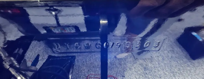 Slide: The Image of Hull identification number on 2003 Ultimate Warlock 29 World Class Offshore Race boat. - 20