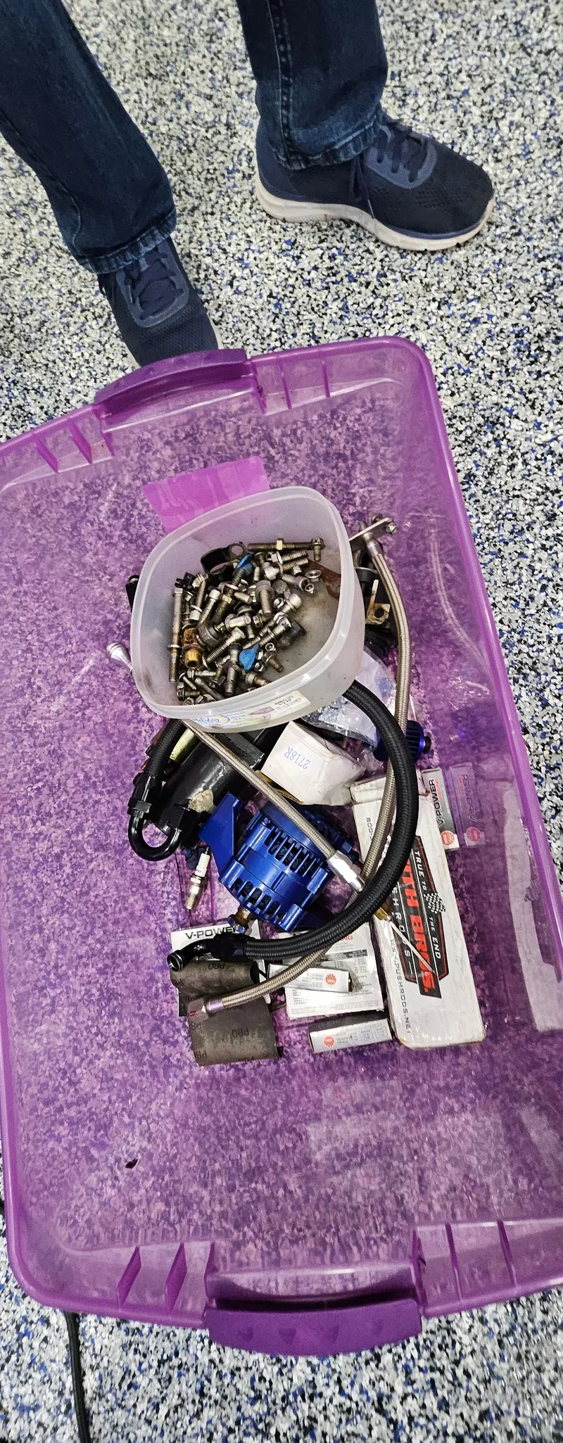 Slide: The Image of Purple container with assorted boat parts for 2003 Ultimate Warlock 29 World Class Offshore Race. - 23