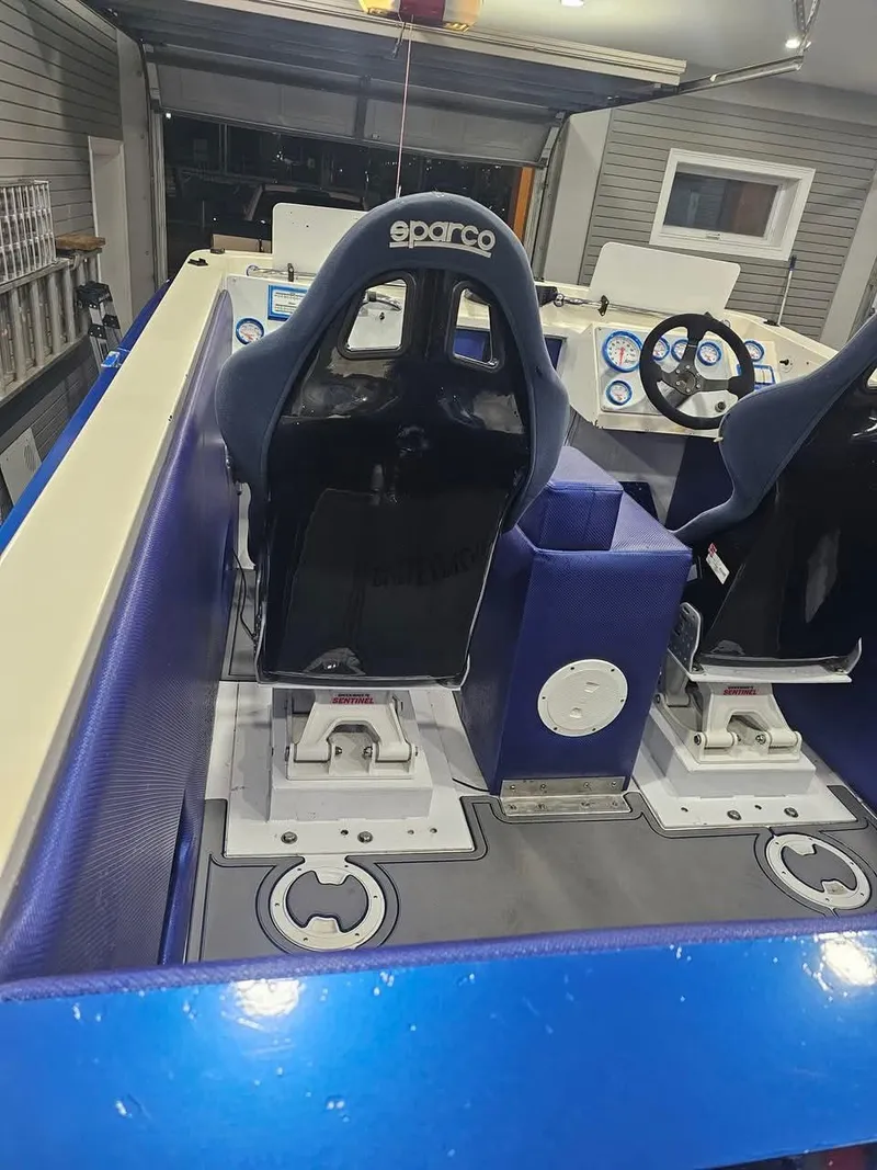 Slide: The Image of 2003 Ultimate Warlock 29 World Class Offshore Race boat interior with Sparco seats. - 28