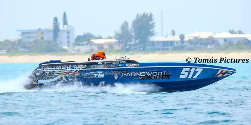 Slide: The Image of Offshore race boat "Ultimate Warlock 29" speeding on water, 2003 model, Farnsworth Motorsports. - 3