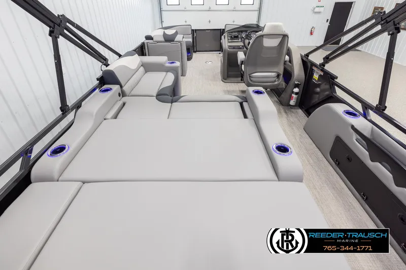 Slide: The Image of 2025 Avalon LSZ Vrl boat interior with luxurious seating and modern design. - 16