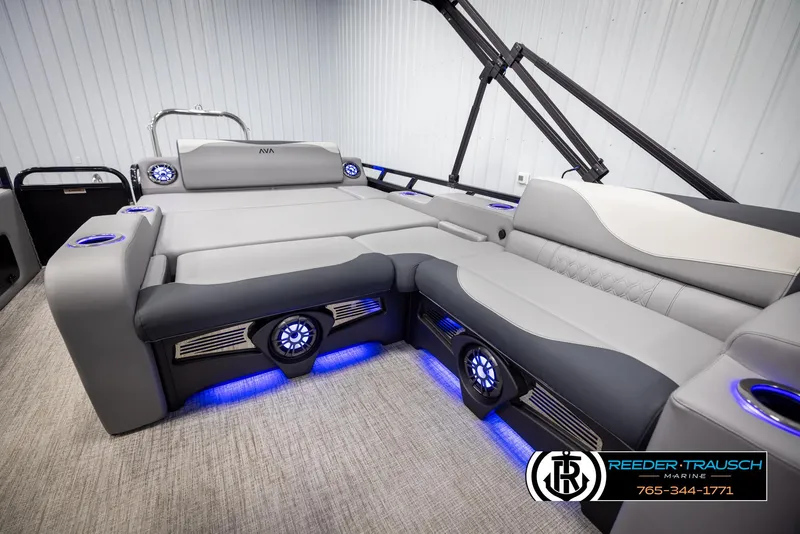 Slide: The Image of 2025 Avalon LSZ Vrl boat interior with modern seating and blue LED lighting. - 23