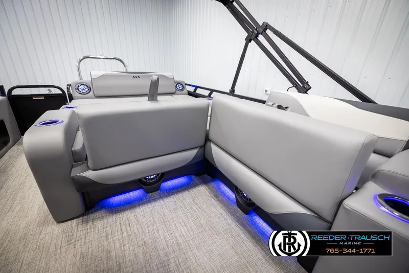 Slide: The Image of 2025 Avalon LSZ Vrl boat interior with gray seating and blue LED lighting. - 26