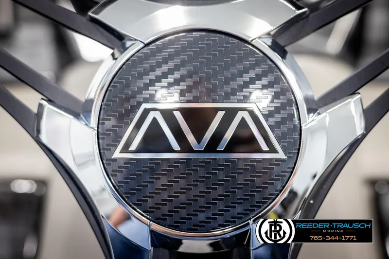 Slide: The Image of Close-up of Avalon LSZ Vrl 2025 steering wheel with carbon fiber design. - 30