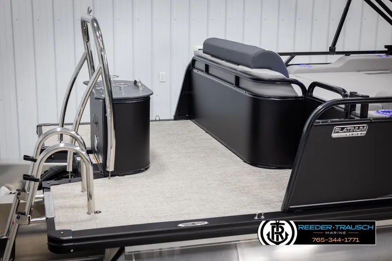 Slide: The Image of Avalon LSZ Vrl 2025 pontoon boat with sleek black design and modern seating. - 47