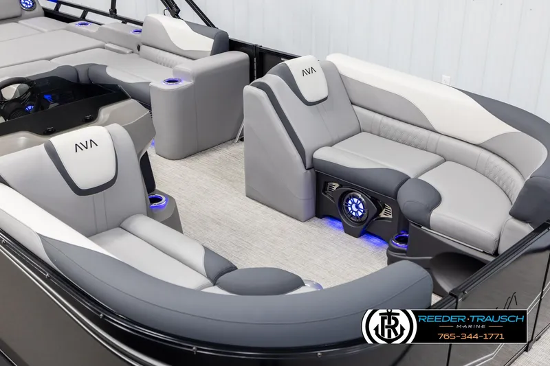Slide: The Image of 2025 Avalon LSZ Vrl boat interior with luxurious seating and ambient lighting. - 9