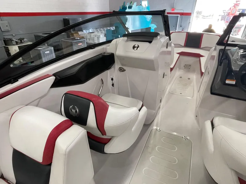 Slide: The Image of Interior of a 2015 Scarab 255 HO Impulse boat with white and red seating. - 13