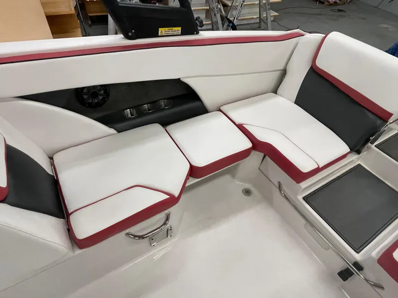 Slide: The Image of 2015 Scarab 255 HO Impulse boat interior with white and red seating. - 17