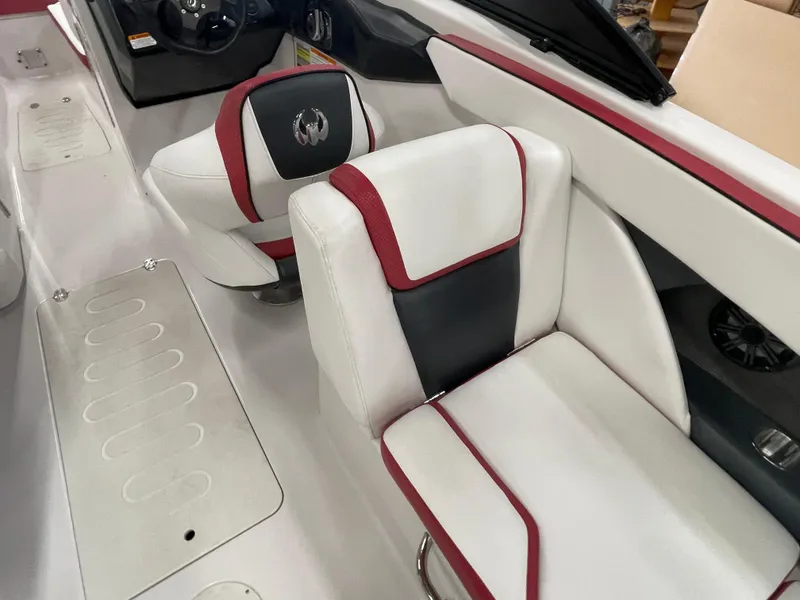 Slide: The Image of 2015 Scarab 255 HO Impulse boat interior with white and red seating. - 20