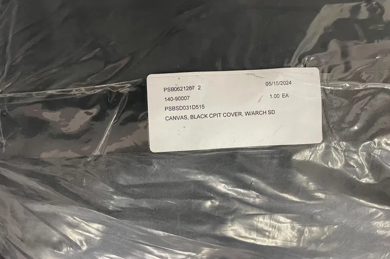 Slide: The Image of Black canvas cover packaging with label for Scarab 255 HO Impulse, 2015 model. - 27