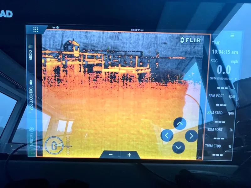 Slide: The Image of Thermal imaging display on Axopar 37 Cabin, showcasing FLIR technology and vessel controls. - 15