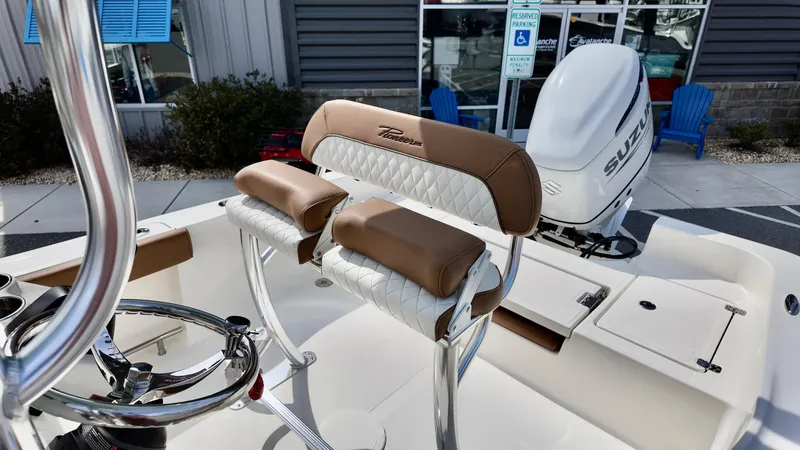 Slide: The Image of 2025 Pioneer 220 Bay Sport boat interior with sleek seating and modern design. - 14