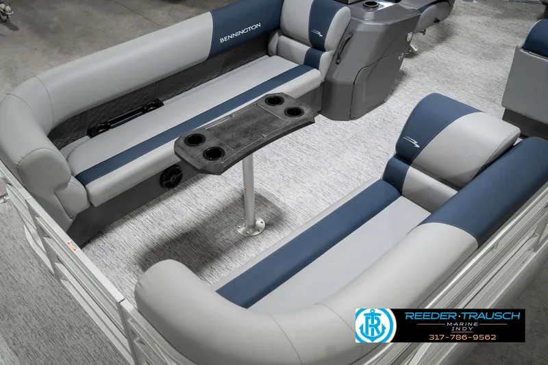 Slide: The Image of 2025 Bennington 22 SLS pontoon boat interior with gray and blue seating. - 11