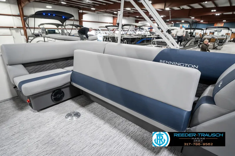 Slide: The Image of 2025 Bennington 22 SLS pontoon boat interior with gray and blue seating. - 28