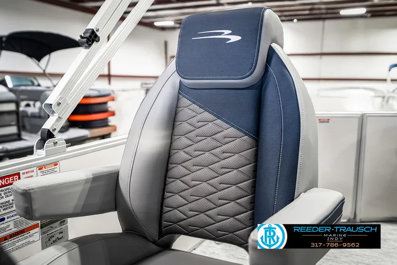 Slide: The Image of 2025 Bennington 22 SLS boat seat with quilted design in showroom. - 39
