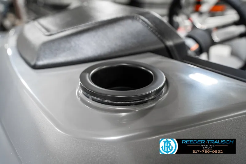 Slide: The Image of 2025 Bennington 22 SLS boat cup holder detail with Reeder-Trausch logo. - 45