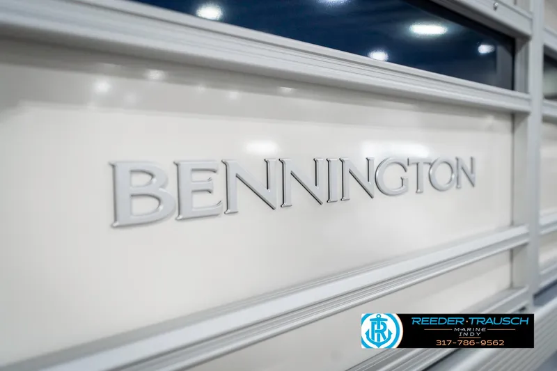 Slide: The Image of 2025 Bennington 22 SLS boat logo with Reeder-Trausch branding. - 56