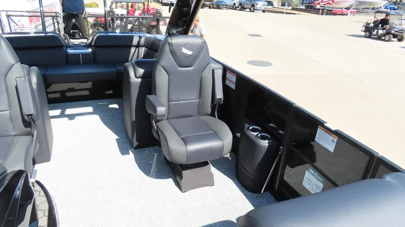 Slide: The Image of 2025 South Bay 25 Sport CR9 3 boat interior with sleek seating and cup holders. - 6