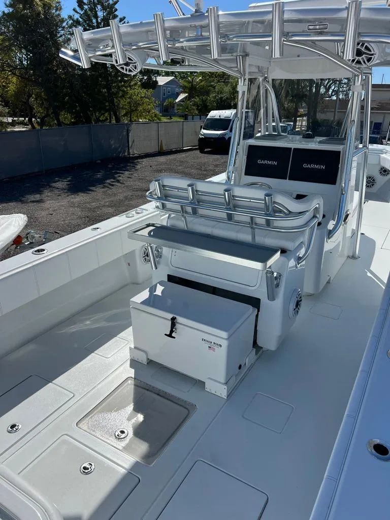 Slide: The Image of 2024 Contender 35 ST boat interior with seating and storage, featuring modern design and equipment. - 4