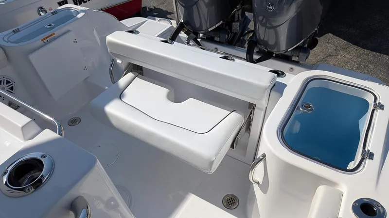 Slide: The Image of 2025 Wellcraft 243 Fisherman boat interior with seating and storage features. - 10