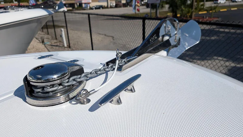 Slide: The Image of 2025 Wellcraft 243 Fisherman boat anchor and chain detail on deck. - 22