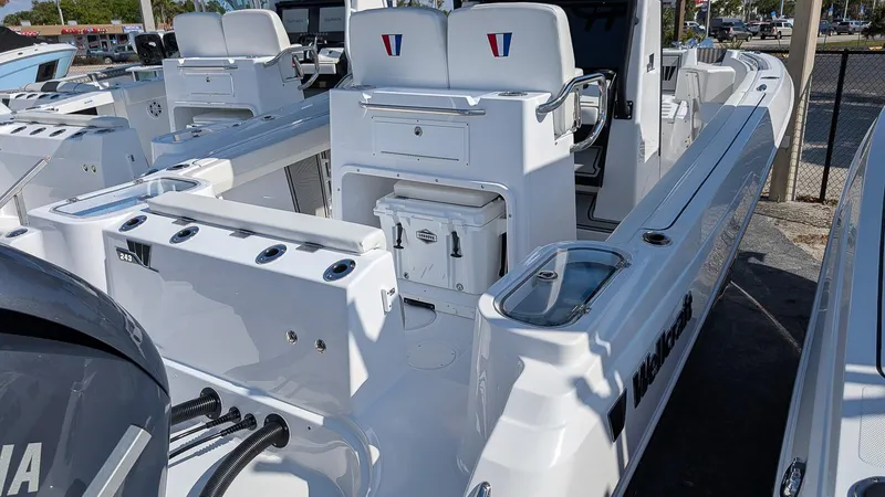 Slide: The Image of 2025 Wellcraft 243 Fisherman boat, white interior, spacious seating, modern design. - 6