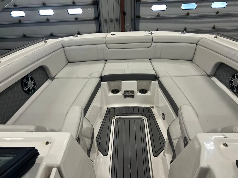 Slide: The Image of 2020 Sea Ray SDX 290 Outboard boat interior with spacious seating and modern design. - 8