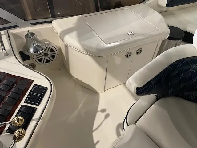 Slide: The Image of Interior view of 2005 Sea Ray 420 Sedan Bridge yacht cockpit area. - 7