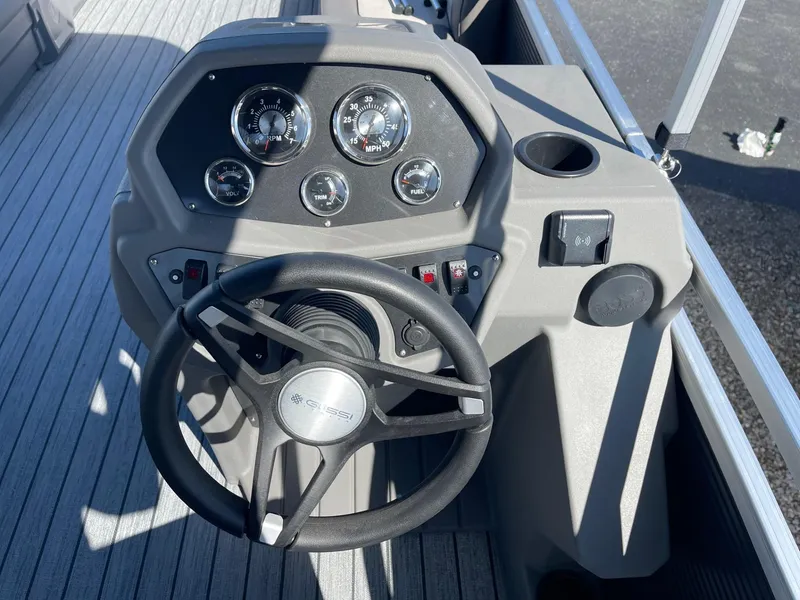 Slide: The Image of Steering console of 2025 Armada Saphir 23CR boat with gauges and controls. - 18