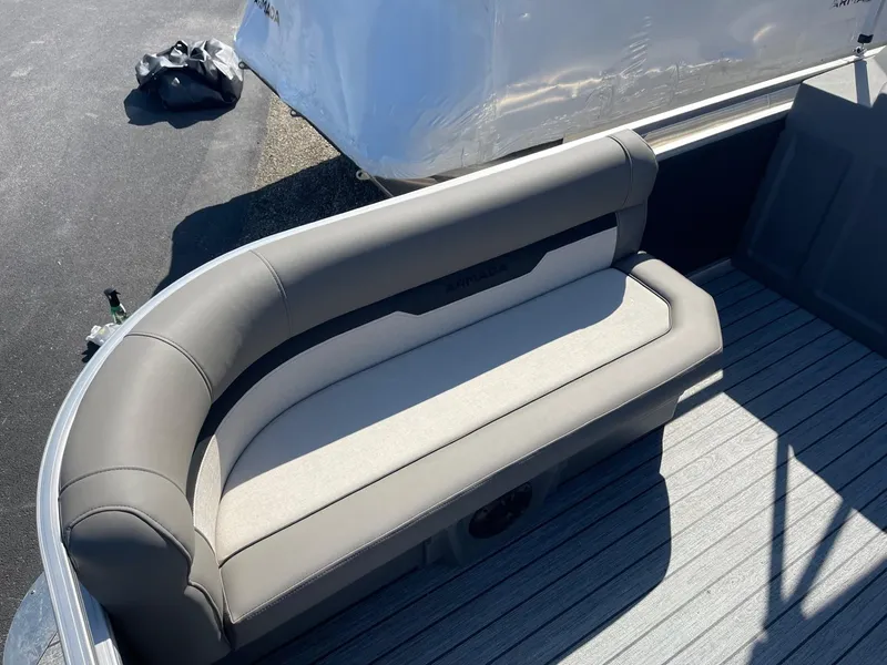 Slide: The Image of Armada Saphir 23CR 2025 boat interior with gray cushioned seating. - 29