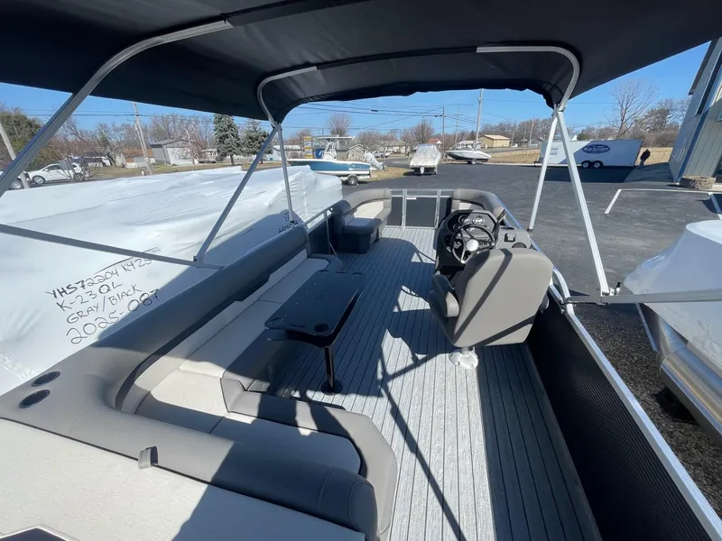 Slide: The Image of 2025 Armada Saphir 23CR pontoon boat interior with seating and steering console. - 8