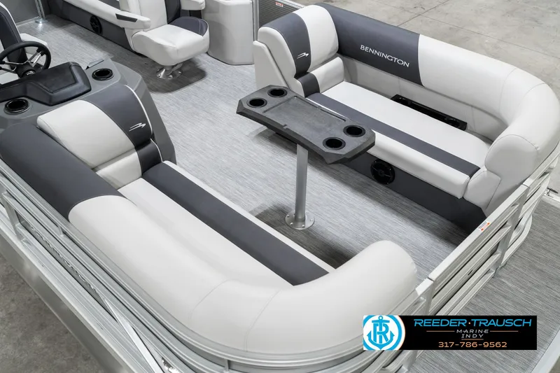 Slide: The Image of 2025 Bennington 20 SSR pontoon boat interior with gray seating and table. - 13