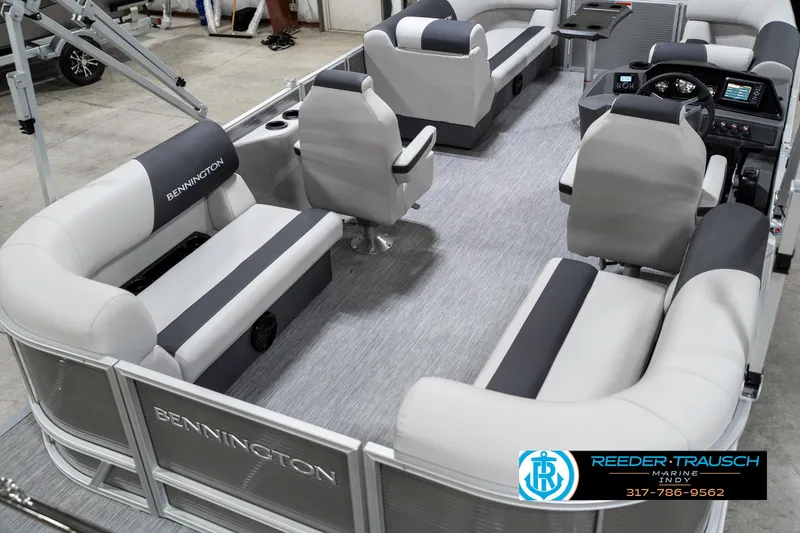 Slide: The Image of 2025 Bennington 20 SSR pontoon boat interior with gray seating and modern design. - 14