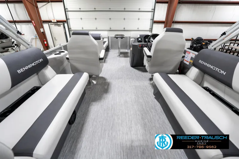 Slide: The Image of 2025 Bennington 20 SSR boat interior with gray seating and modern design. - 19