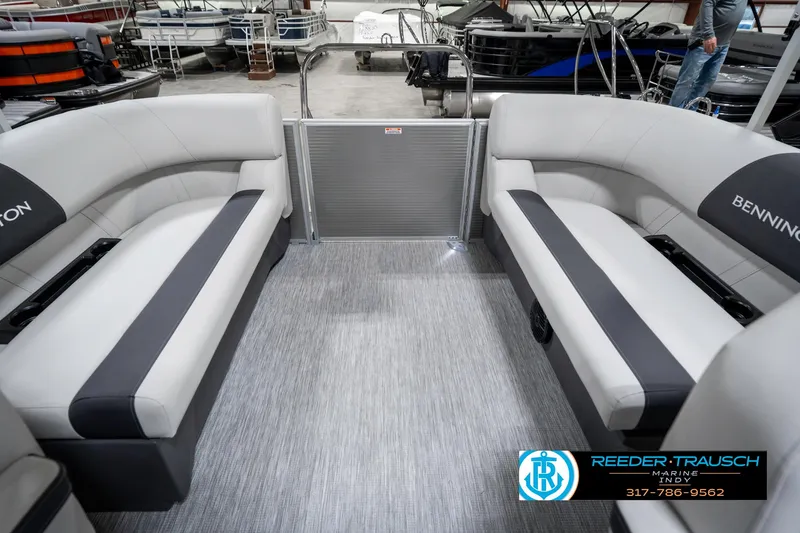 Slide: The Image of 2025 Bennington 20 SSR pontoon boat interior with gray seating and flooring. - 26