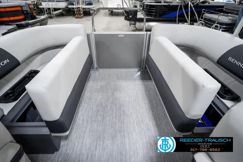 Slide: The Image of 2025 Bennington 20 SSR pontoon boat interior with gray seating and flooring. - 27