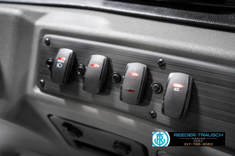Slide: The Image of Dashboard switches of 2025 Bennington 20 SSR boat, featuring modern controls. - 35