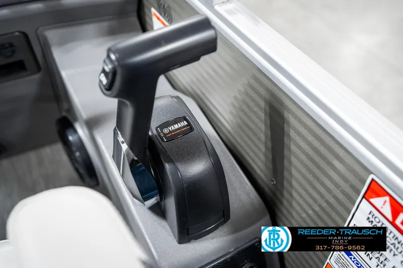 Slide: The Image of 2025 Bennington 20 SSR boat throttle control with Yamaha branding, Reeder-Trausch Marine logo visible. - 36
