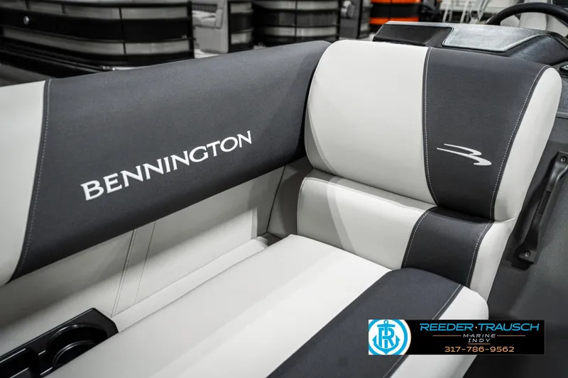 Slide: The Image of 2025 Bennington 20 SSR boat interior with branded seating and logo. - 38