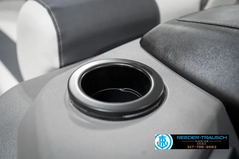 Slide: The Image of 2025 Bennington 20 SSR boat interior with cup holder and seating detail. - 43