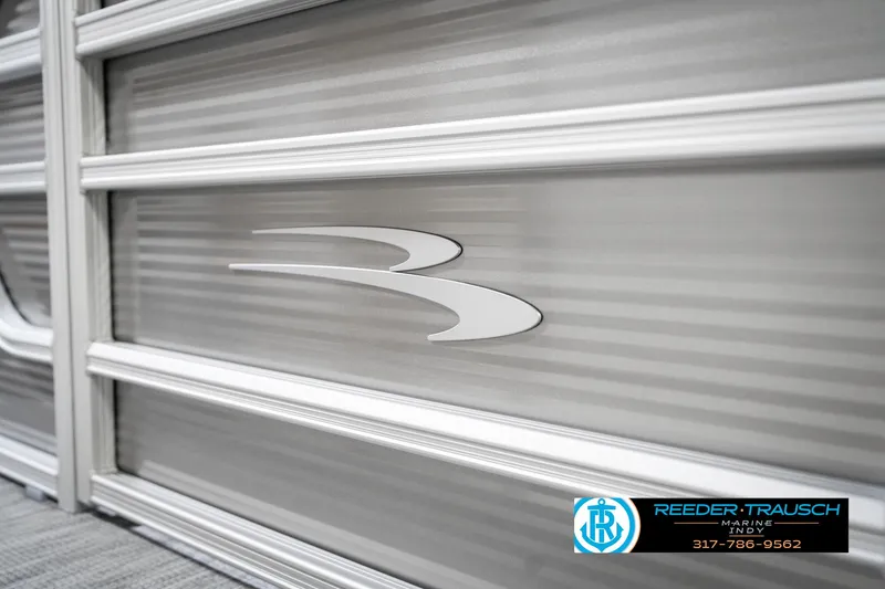 Slide: The Image of 2025 Bennington 20 SSR pontoon boat side panel with logo detail. - 47