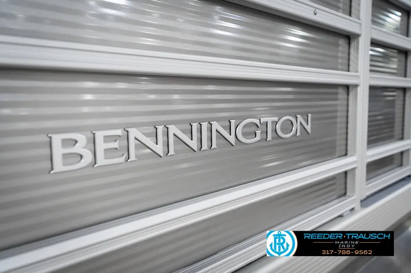 Slide: The Image of 2025 Bennington 20 SSR boat exterior with brand logo and dealership contact information. - 48
