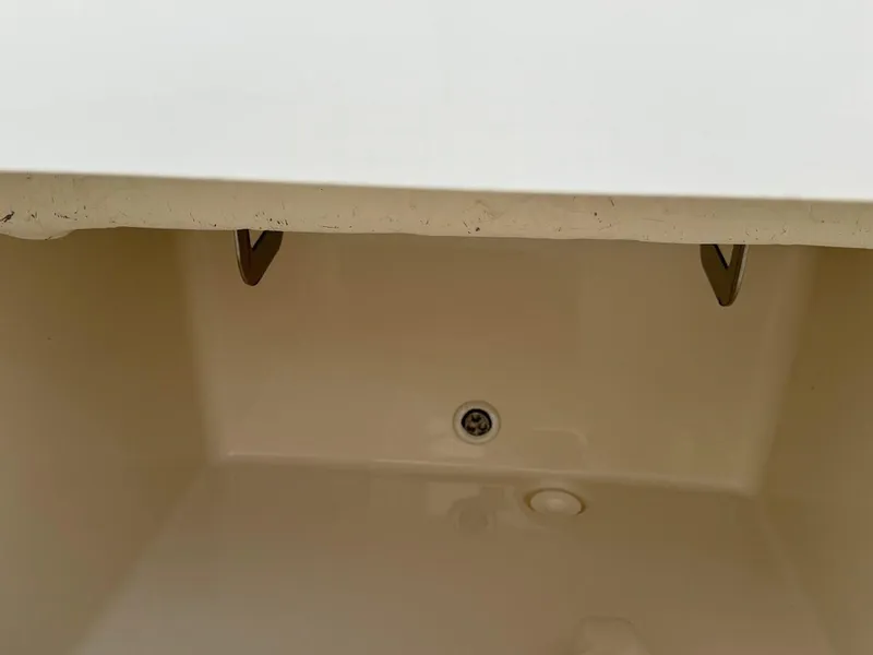 Slide: The Image of 2020 Regulator 26XO boat storage compartment interior view. - 39