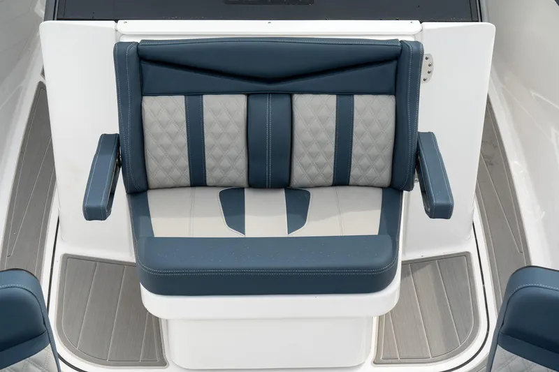 Slide: The Image of 2025 Monterey Elite 27 OB boat seat with blue and gray upholstery. - 29