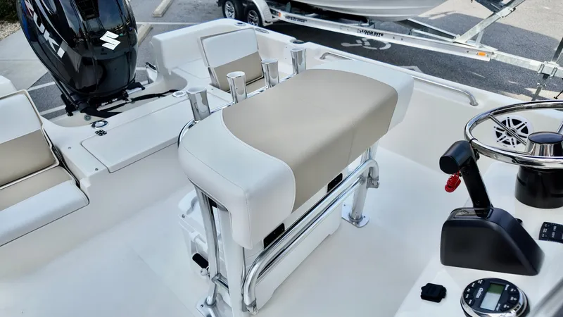 Slide: The Image of 2026 Bulls Bay 2200 XS boat interior with seating and steering console. - 10