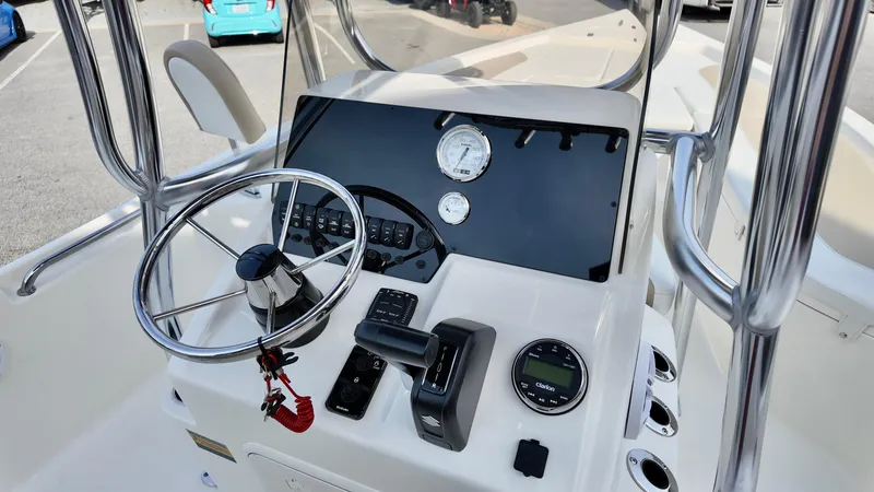 Slide: The Image of 2026 Bulls Bay 2200 XS boat console with steering wheel and gauges. - 9