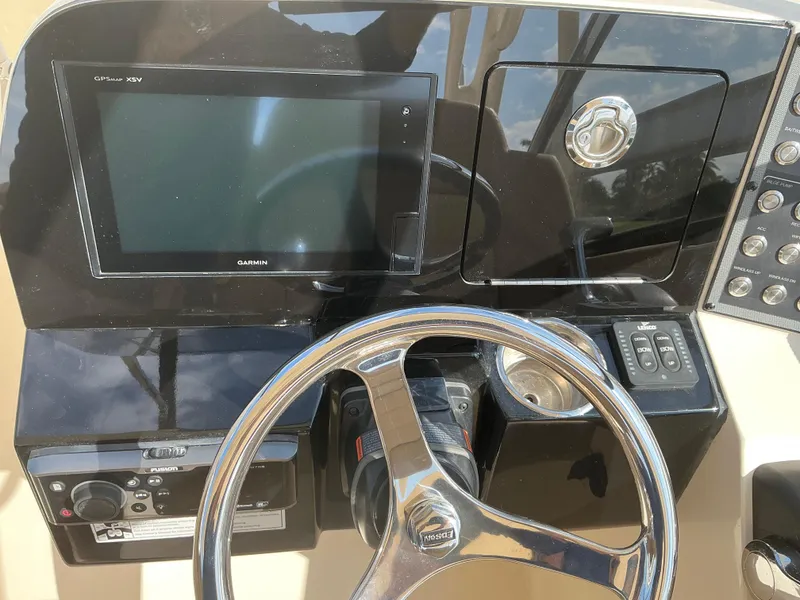 Slide: The Image of 2019 Scout 255 Dorado boat wiring and control panel setup. - 19