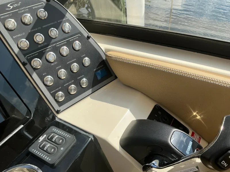 Slide: The Image of 2019 Scout 255 Dorado boat seat with storage compartment open. - 31
